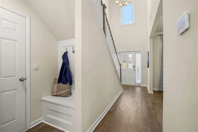 a kitchen with stainless steel appliances a stove a sink and a microwave