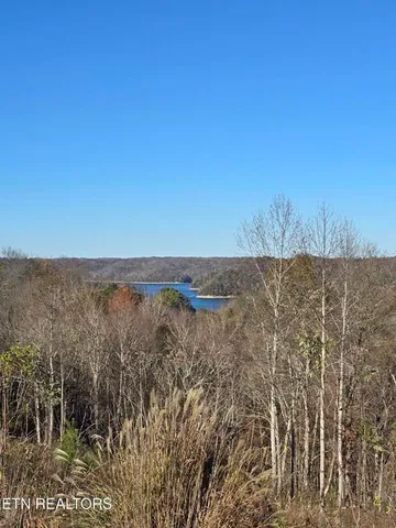 a view of roof with a city view