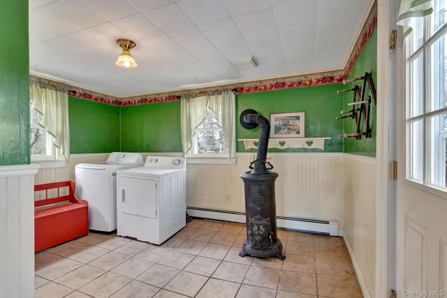 a view of a kitchen with a sink and dishwasher