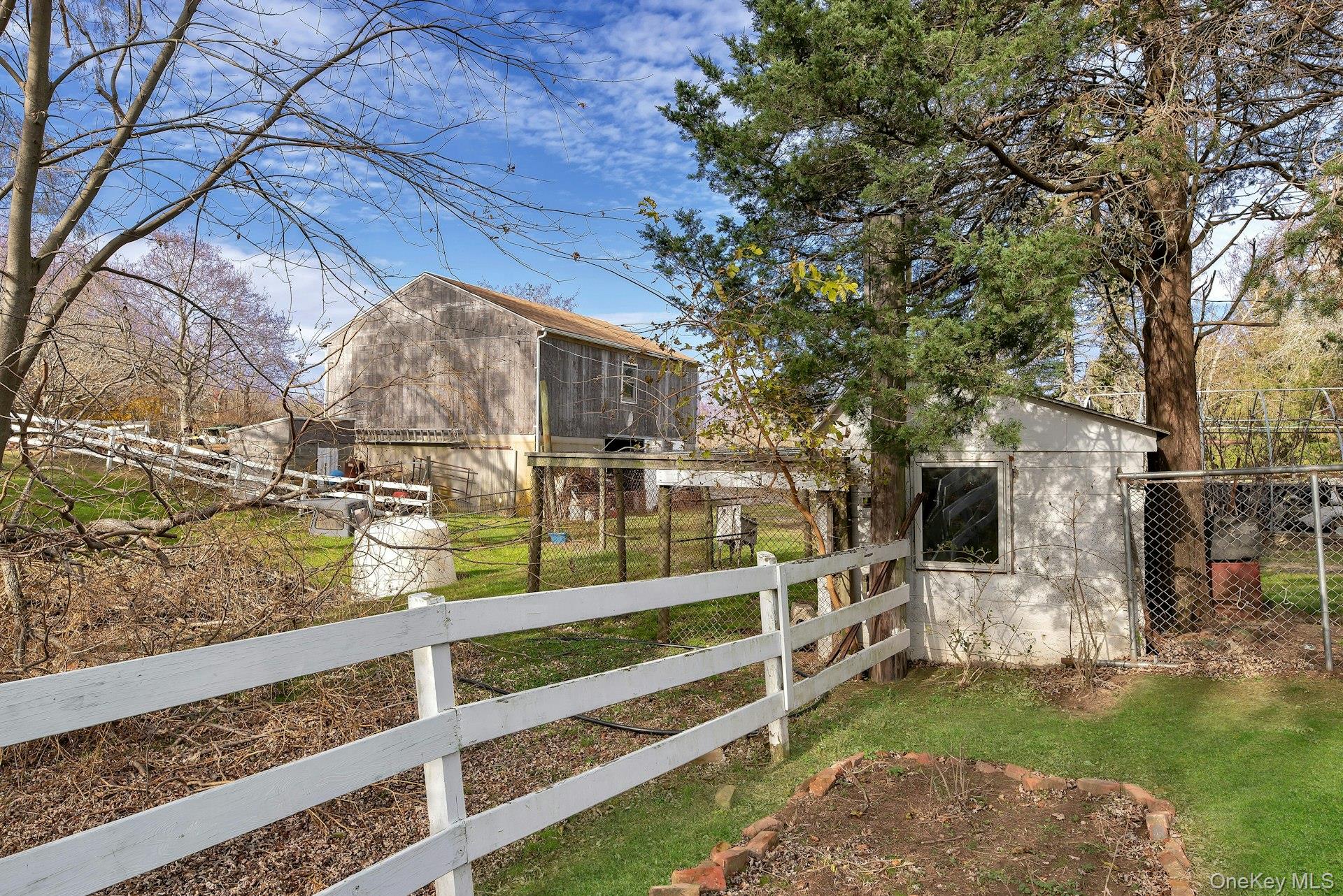 1760 Albertson Lane Greenport, NY 11944 - Photo 24 of 40 View of yard featuring an outdoor structure