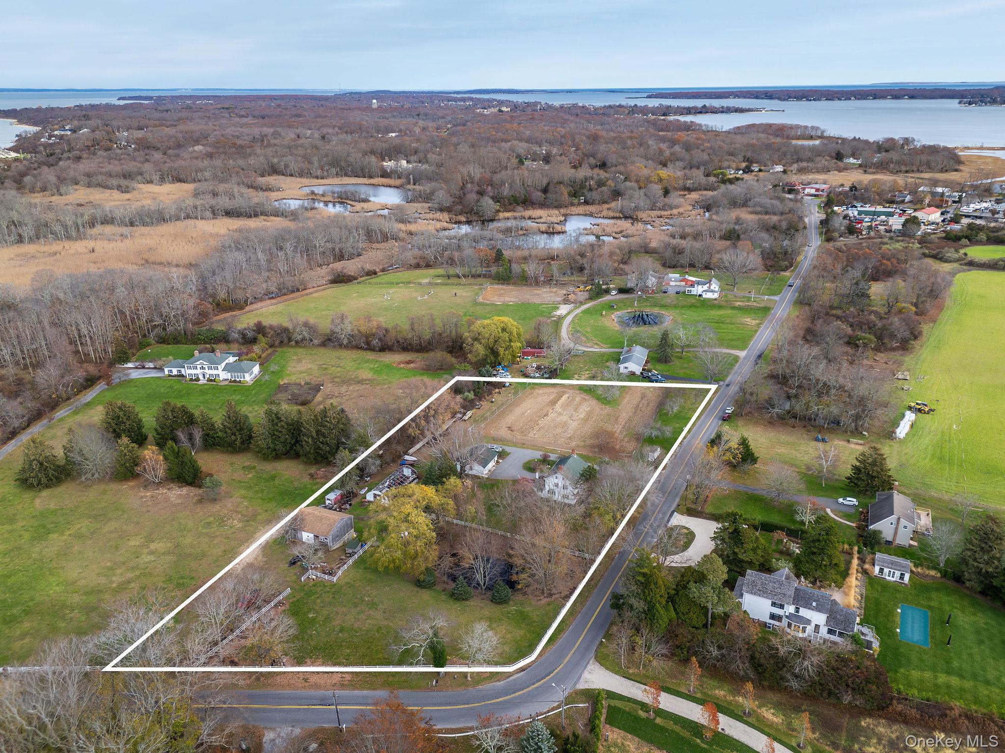1760 Albertson Lane Greenport, NY 11944 - Photo 39 of 40 Aerial view of property's location with a nearby body of water and property boundaries highlighted