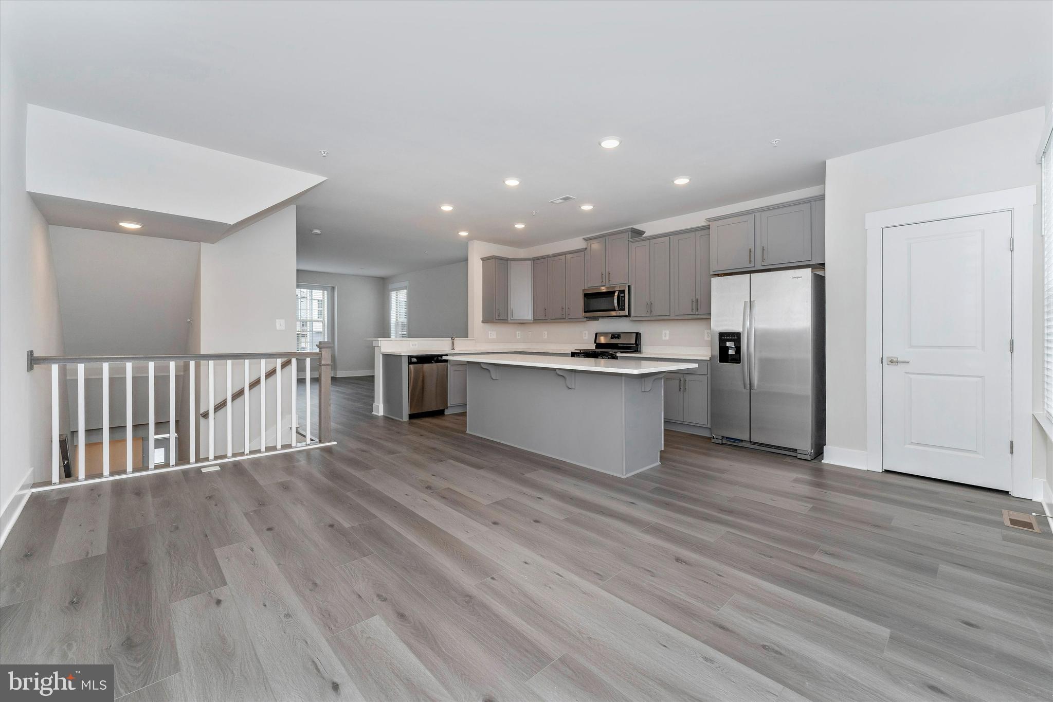 2923 Osprey Way Frederick, MD 21701 - Photo 14 of 42 a view of kitchen view wooden floor stainless steel appliances and cabinets