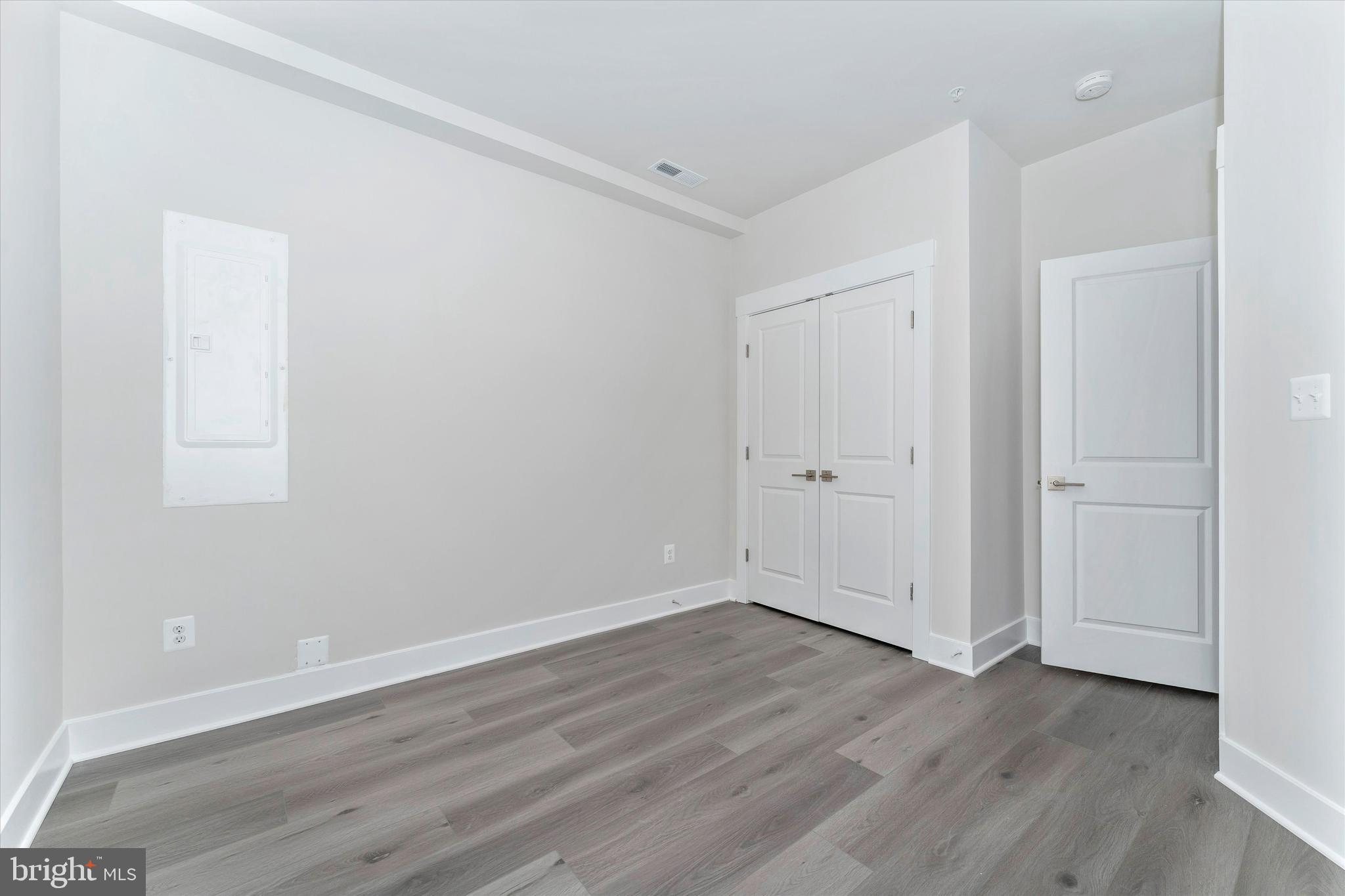 2923 Osprey Way Frederick, MD 21701 - Photo 25 of 42 a view of an empty room with wooden floor