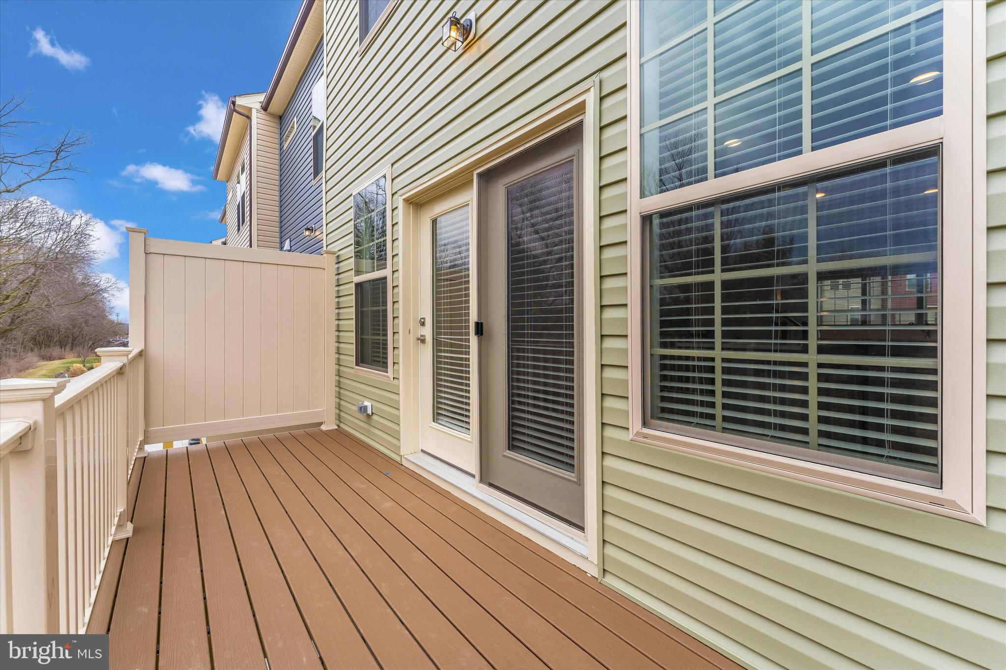 2923 Osprey Way Frederick, MD 21701 - Photo 4 of 42 a view of a house with a door and wooden floor