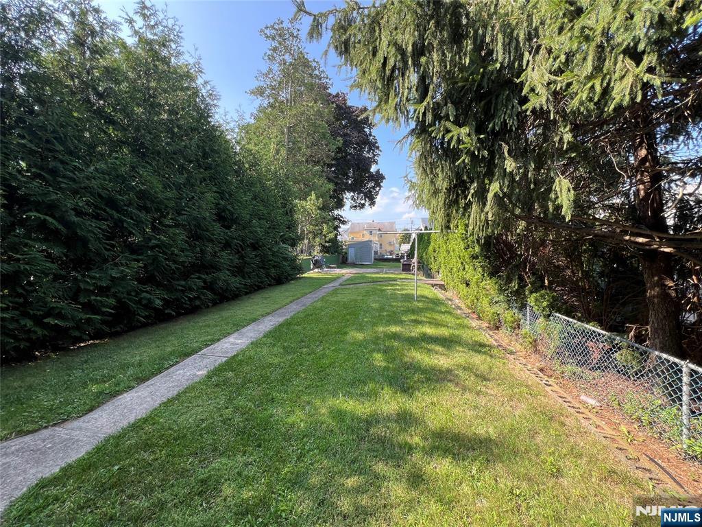 68 Liberty Street, Unit 1 Lodi, NJ 07644 - Photo 22 of 23 a view of a trees with a yard