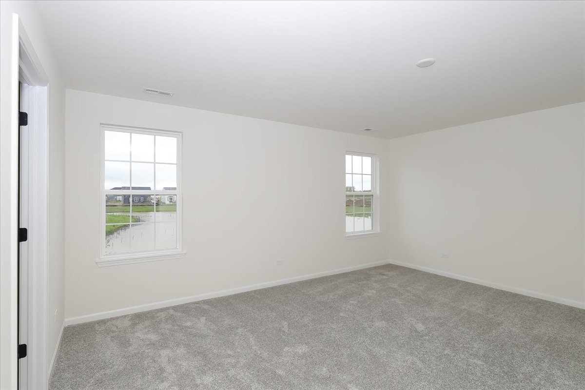 860 Preston Lane Oswego, IL 60543 - Photo 24 of 34 an empty room with a window