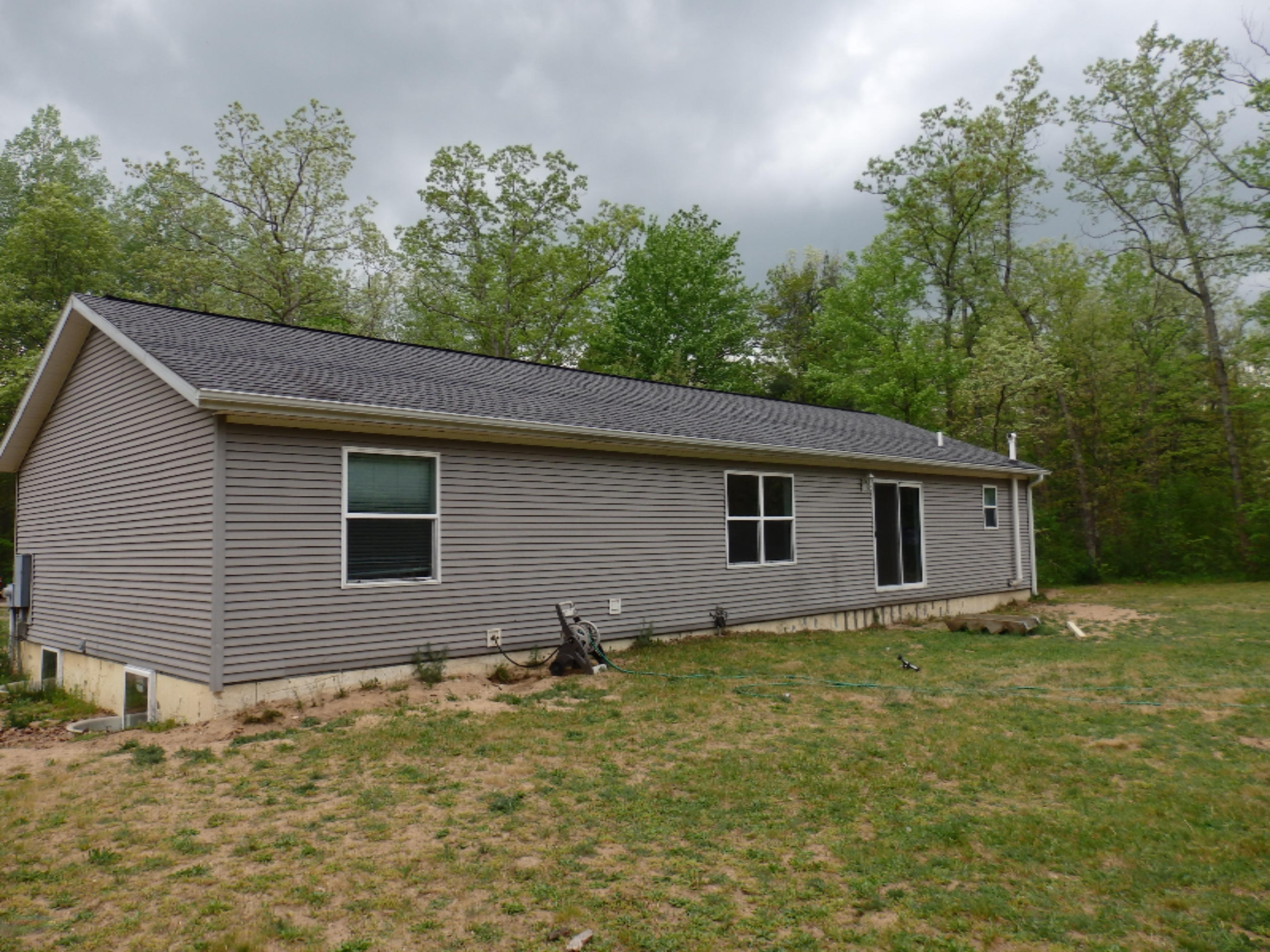 1143 Laverne Road Wellston, MI 49689 - Photo 20 of 21 rear of house