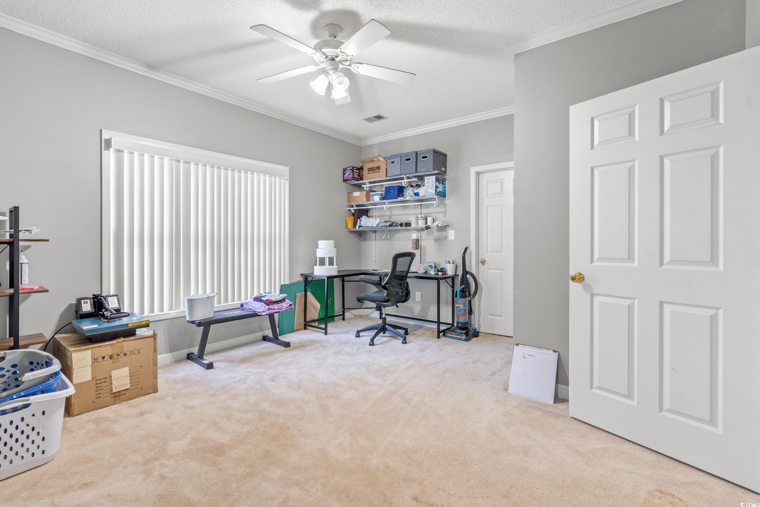 509 Shellbank Drive, Unit B Longs, SC 29568 - Photo 16 of 33 Carpeted office with ornamental molding, a ceiling fan, and a textured ceiling