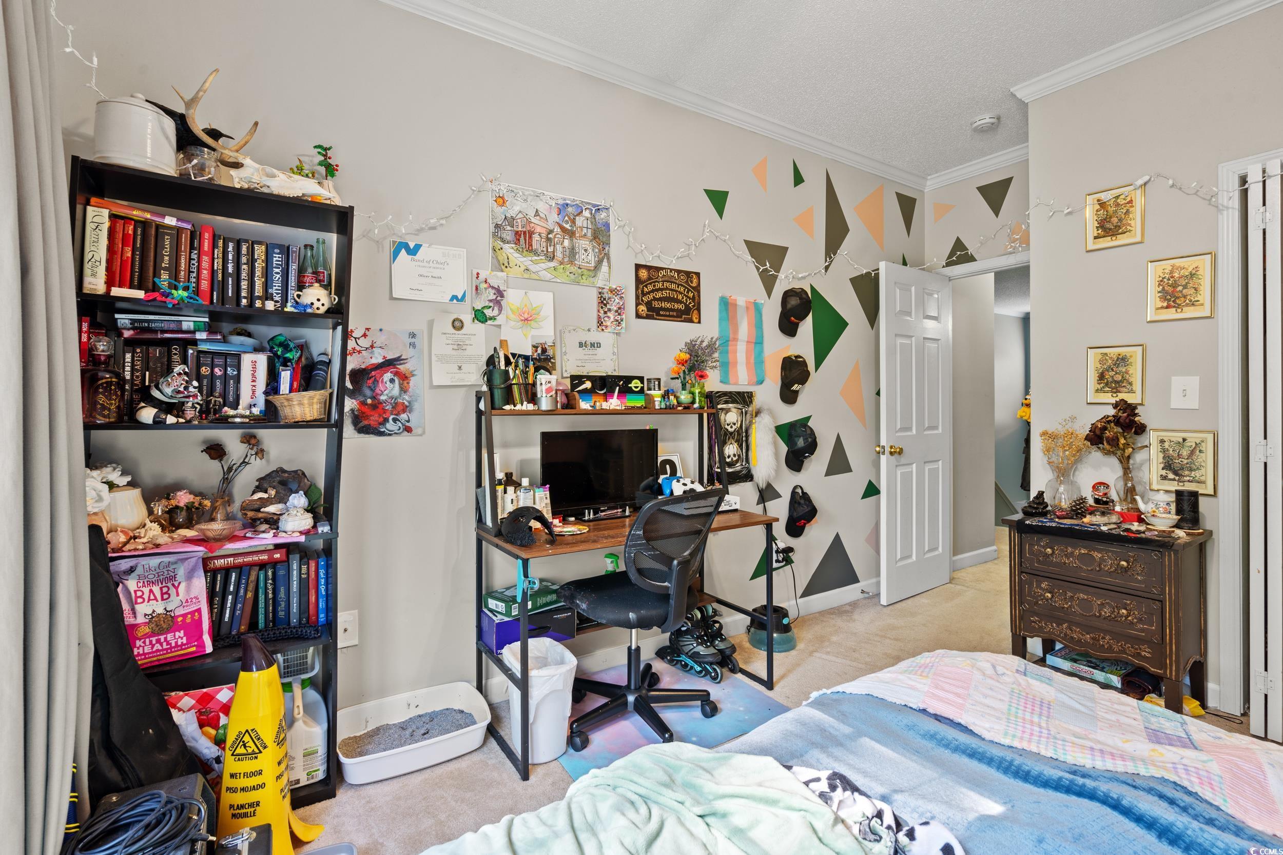 509 Shellbank Drive, Unit B Longs, SC 29568 - Photo 29 of 33 Bedroom featuring crown molding, carpet flooring, and a desk
