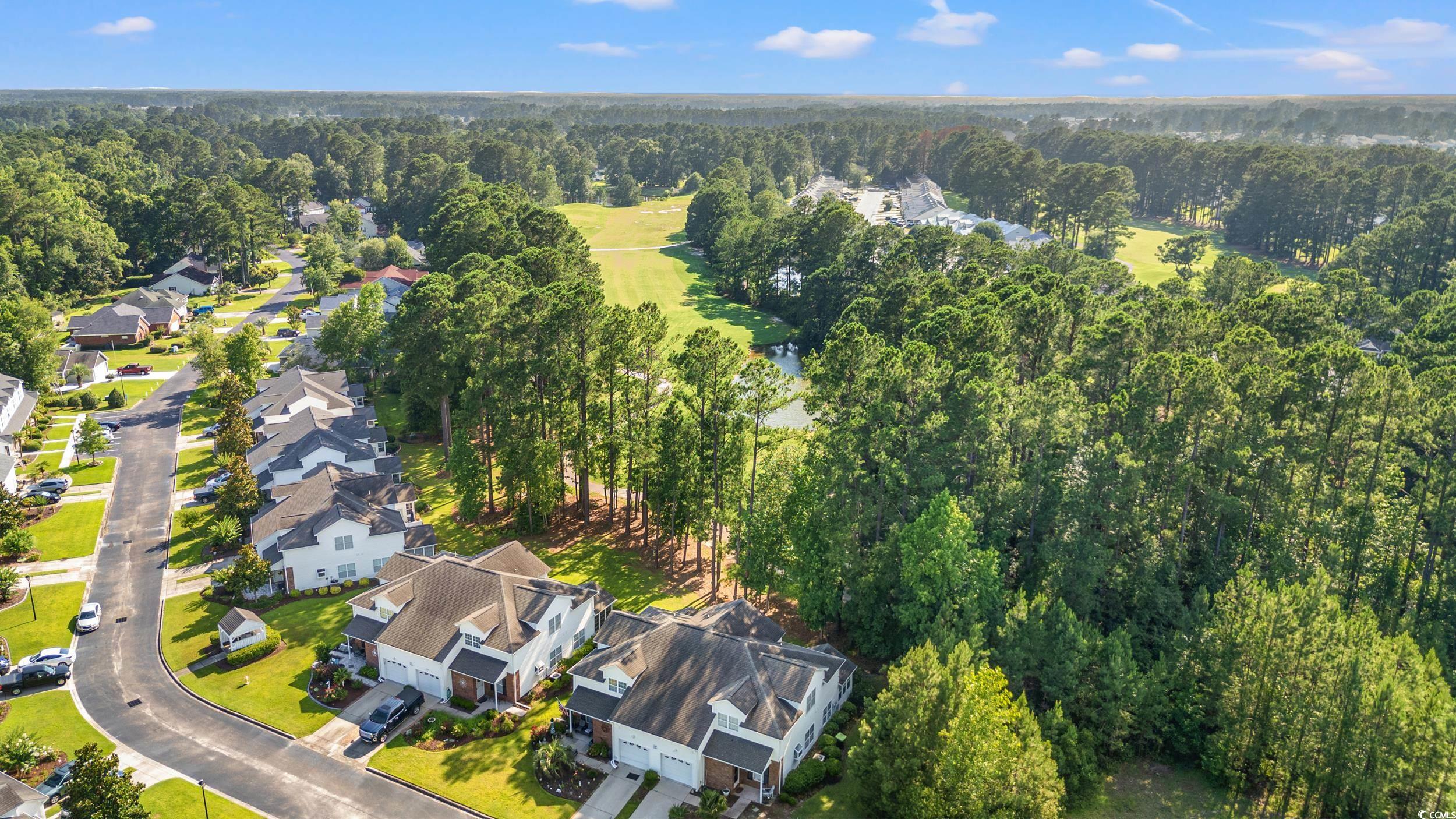 509 Shellbank Drive, Unit B Longs, SC 29568 - Photo 33 of 33 Aerial overview of property's location featuring nearby suburban area and a heavily wooded area