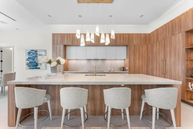 a spacious bedroom with a bed and a couch