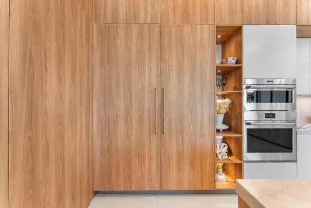 a view of a livingroom with furniture window and wooden floor