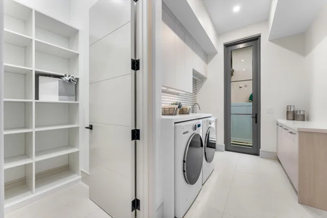 a view of a livingroom with wooden floor and window