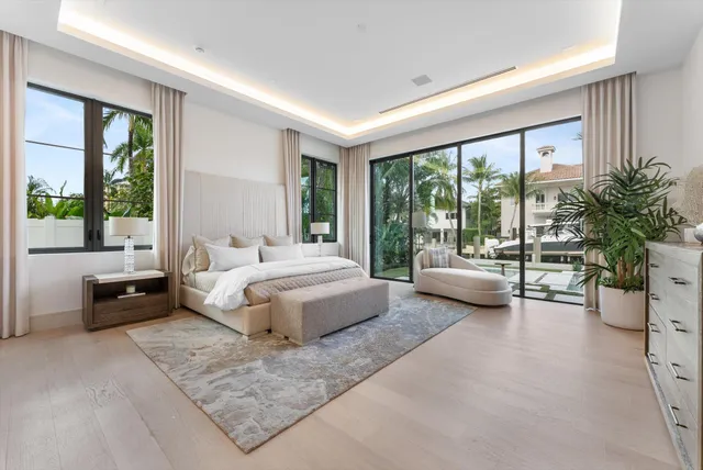 a view of a house with a yard porch and sitting area