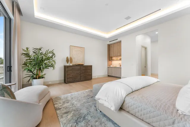 a view of a house with a yard and plants