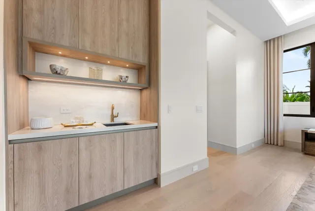 a view of a house with swimming pool and porch with furniture