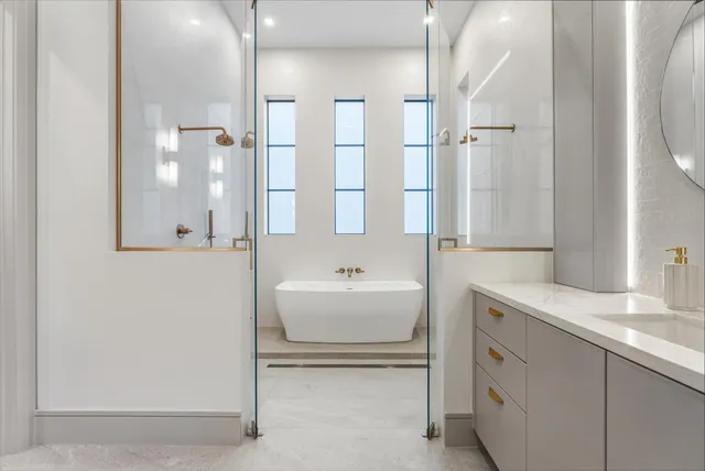 an aerial view of multiple houses with a yard