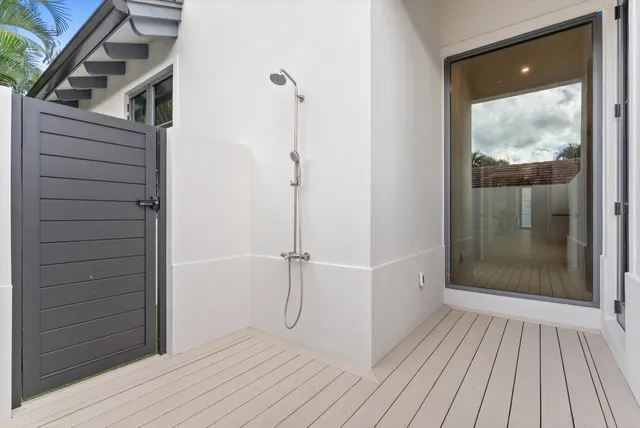 a front view of a house with a yard table and chairs
