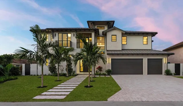 a kitchen with a refrigerator and a sink