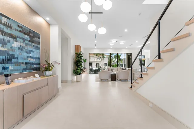 a kitchen with stainless steel appliances a stove and a refrigerator