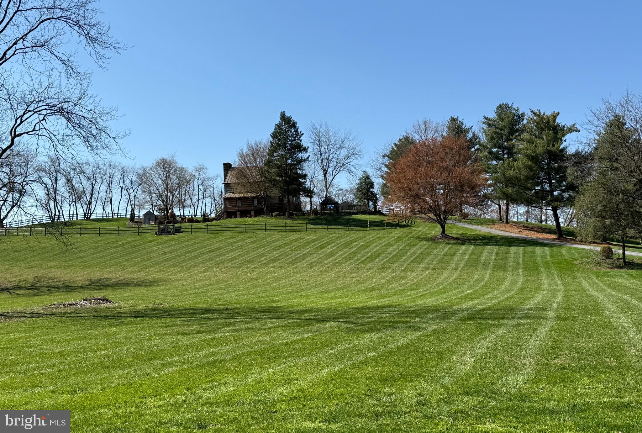 3646 Meadow View Road Manheim, PA 17545 - Photo 9 of 56 a view of a golf course with a lake
