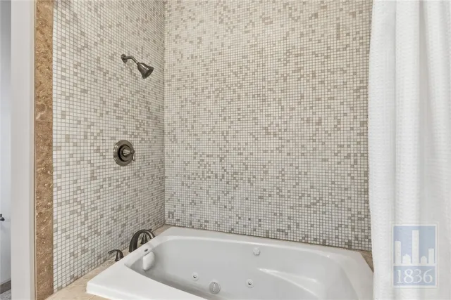 a bathroom with a bathtub