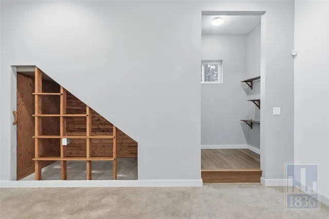 an empty room with windows