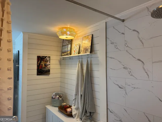a bathroom with a sink and mirror