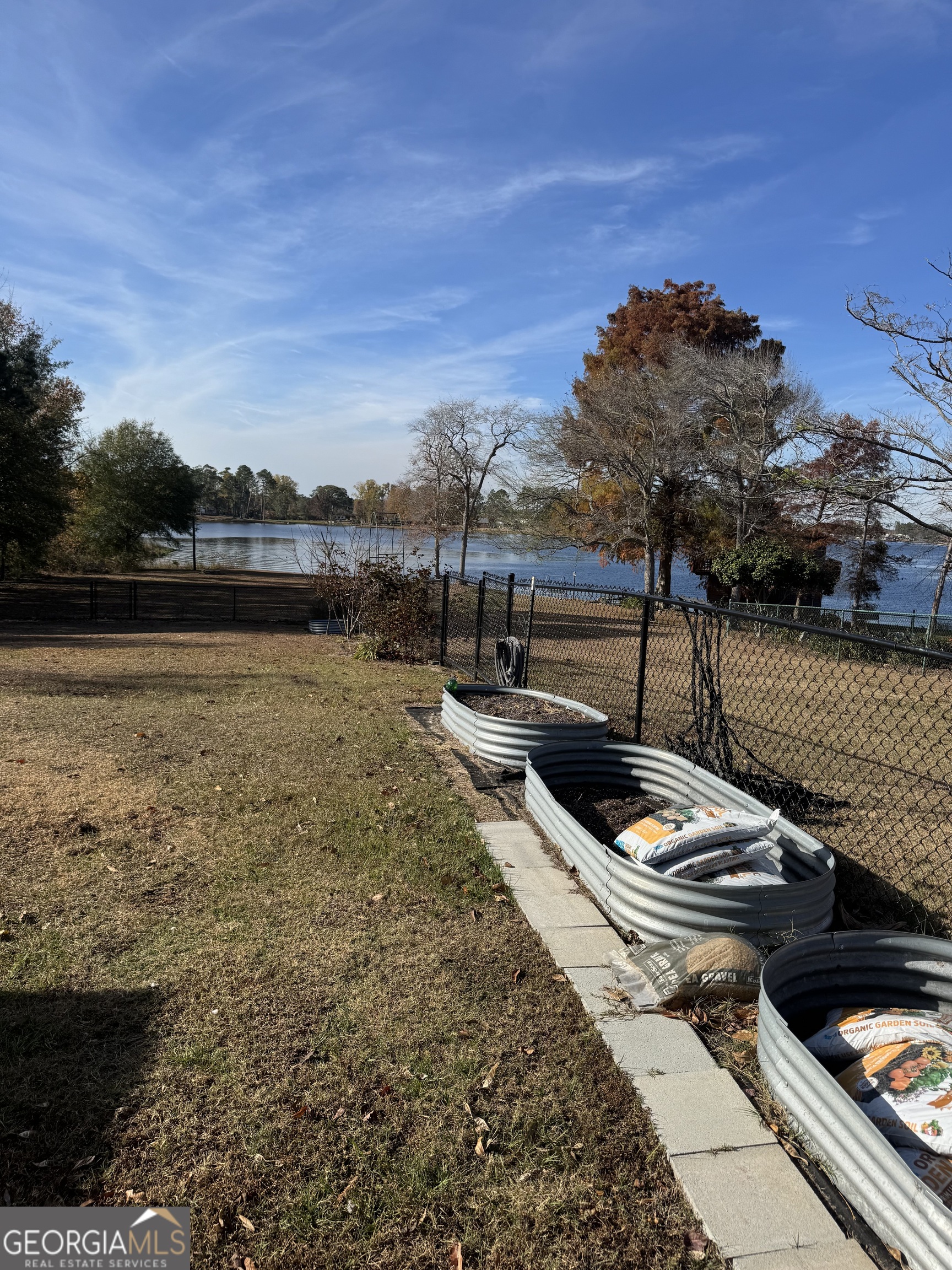 2648 Buck Head Road Baxley, GA 31513 - Photo 3 of 20 a view of a lake with a outdoor space