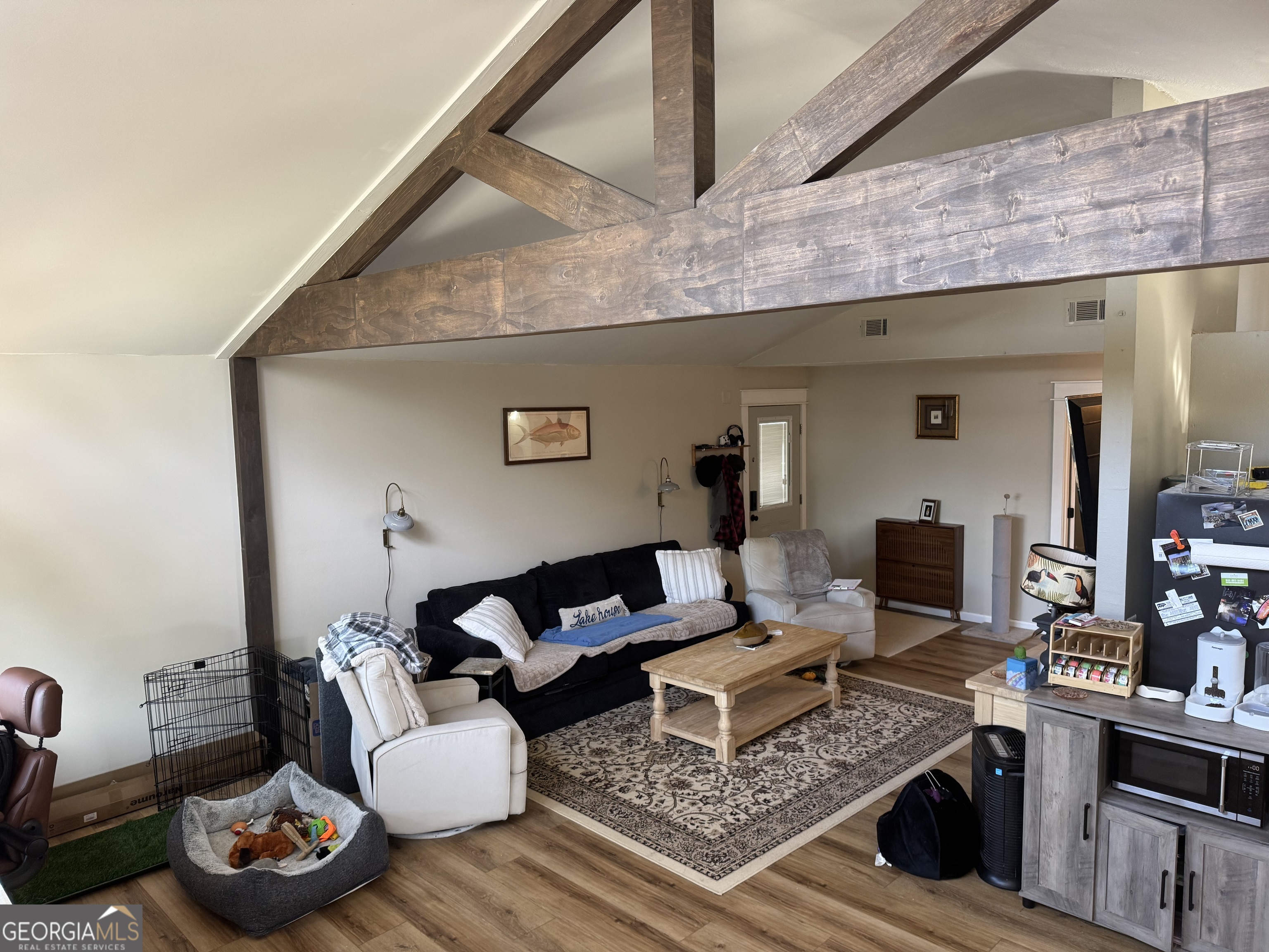 2648 Buck Head Road Baxley, GA 31513 - Photo 6 of 20 a living room with furniture and a wooden floor