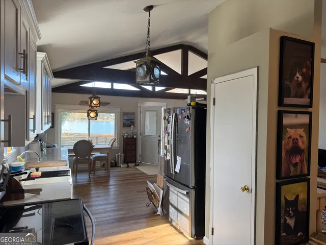 a view of a livingroom with furniture and window