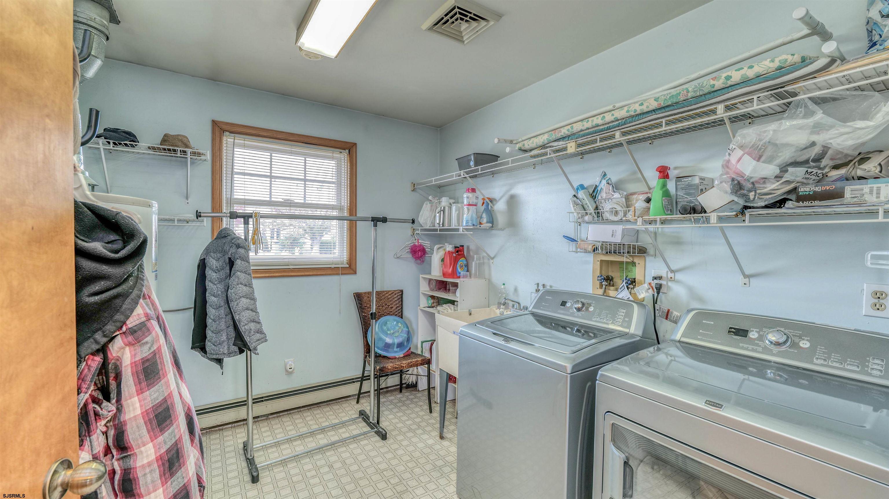 715 Lafayette Boulevard Brigantine, NJ 08203 - Photo 14 of 31 a room with storage and utility