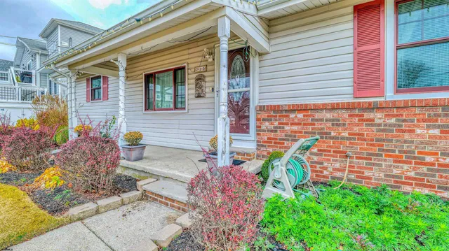 a front view of a house with outdoor space