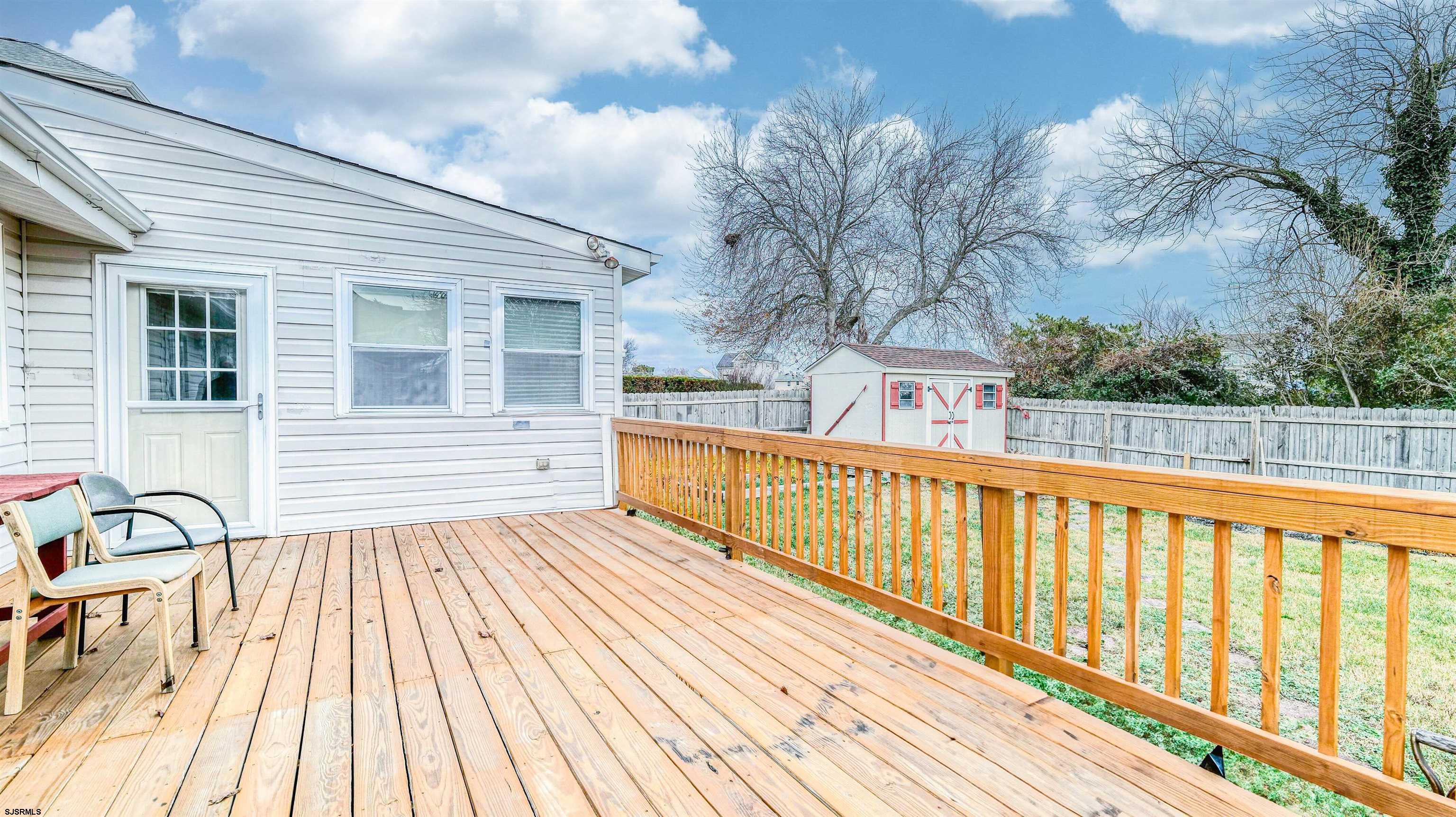 715 Lafayette Boulevard Brigantine, NJ 08203 - Photo 23 of 31 a view of outdoor space with deck and a garden