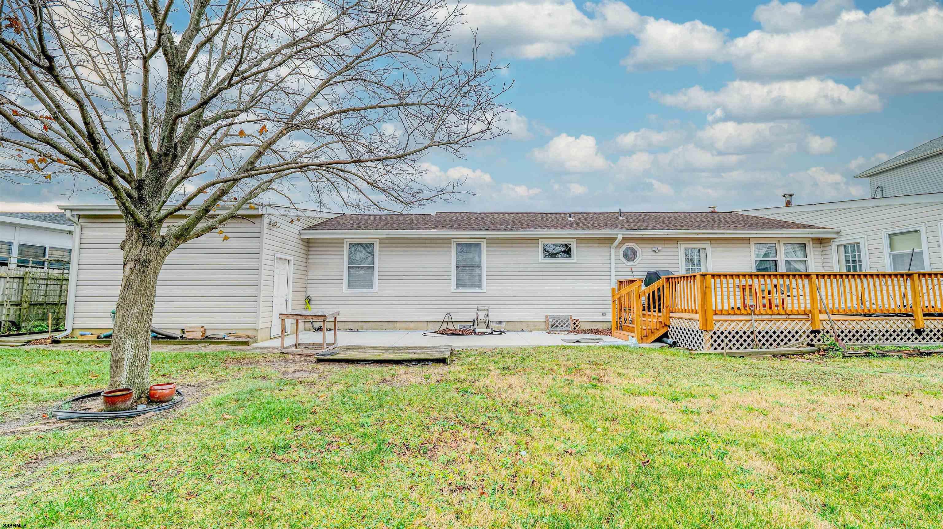 715 Lafayette Boulevard Brigantine, NJ 08203 - Photo 25 of 31 a front view of house with yard