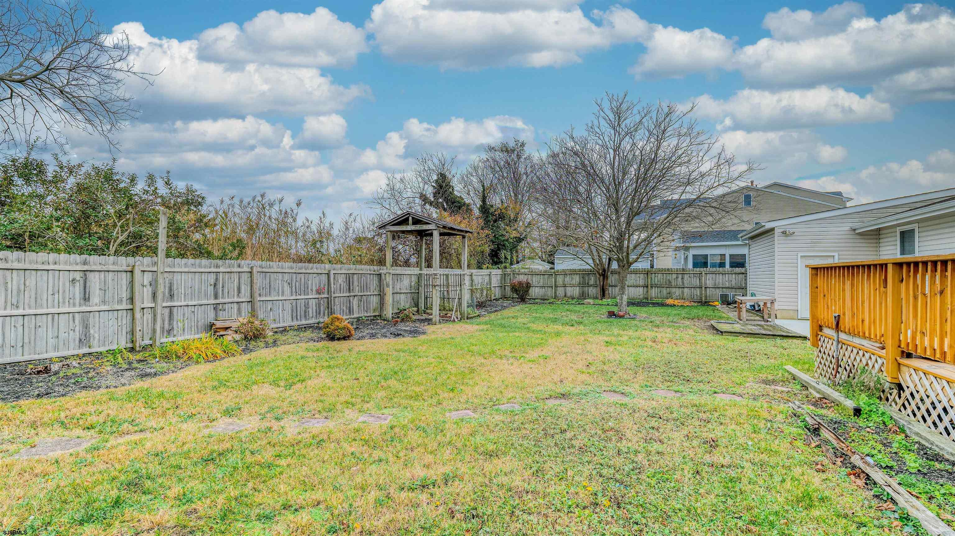 715 Lafayette Boulevard Brigantine, NJ 08203 - Photo 28 of 31 a view of backyard with green space