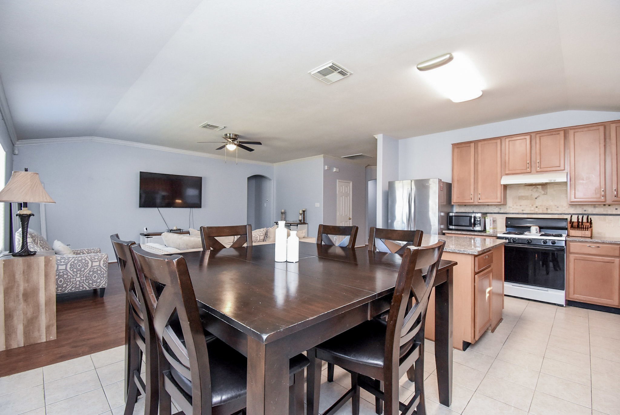 8502 Parapet Place Rosharon, TX 77583 - Photo 15 of 34 a view of a dining room with furniture and wooden floor