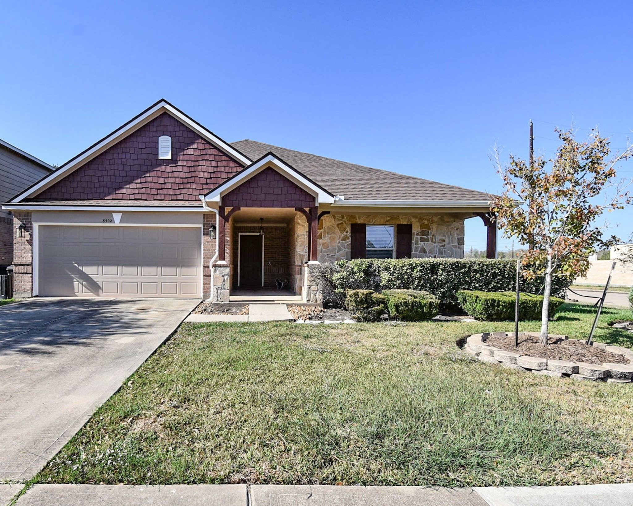 8502 Parapet Place Rosharon, TX 77583 - Photo 2 of 34 a front view of a house with a yard