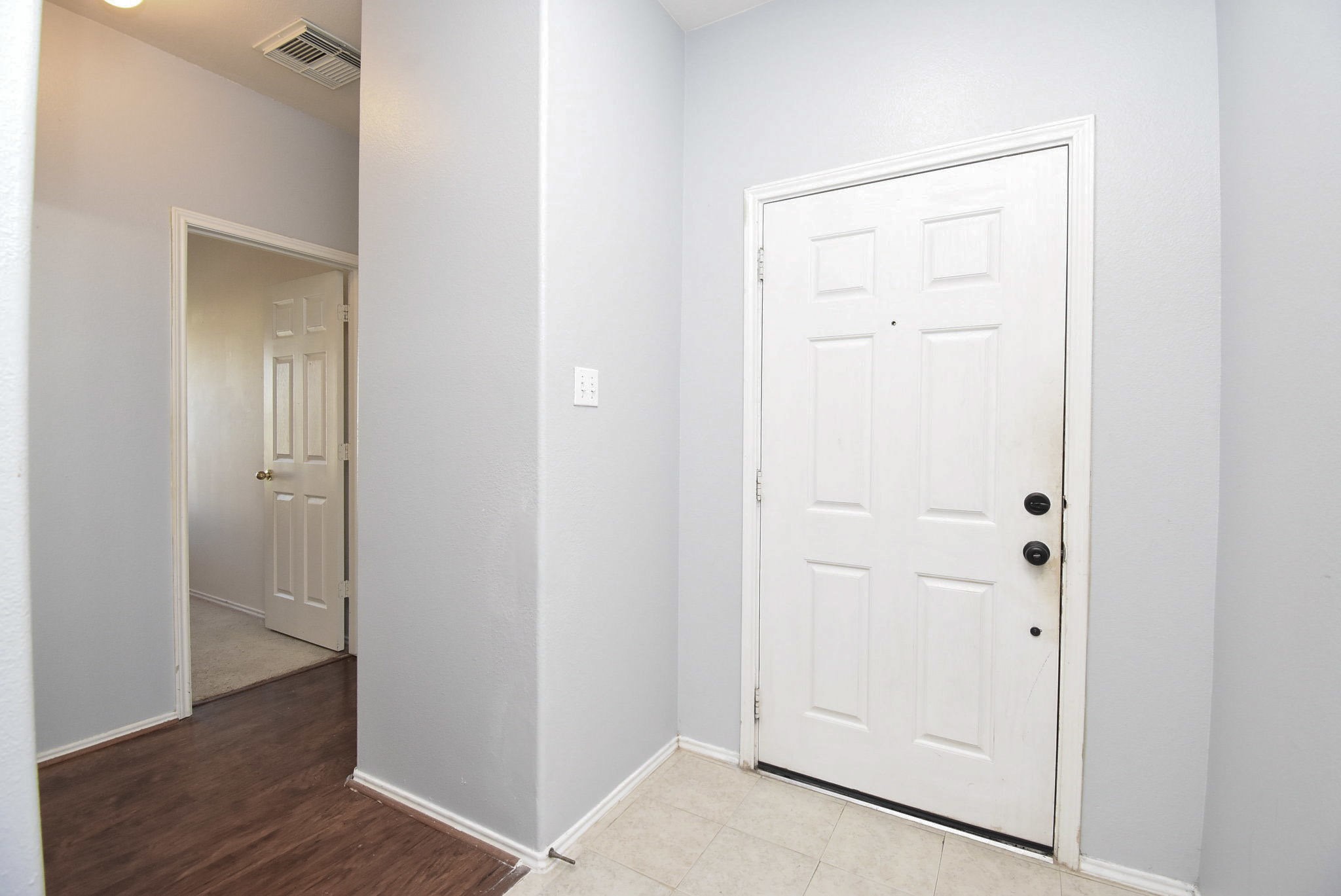 8502 Parapet Place Rosharon, TX 77583 - Photo 5 of 34 an empty room with wooden floor & closet area
