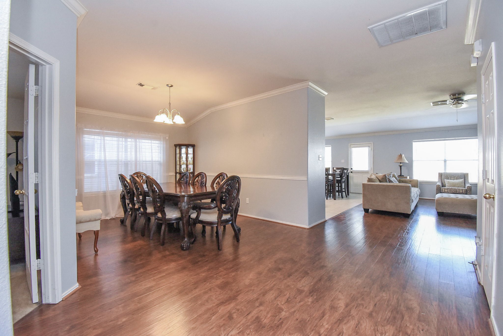 8502 Parapet Place Rosharon, TX 77583 - Photo 34 of 34 a view of a dining room with furniture and wooden floor