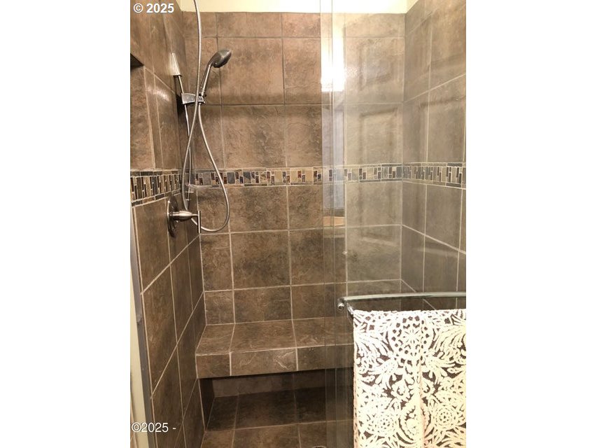 3512 Highway 101 Yachats, OR 97498 - Photo 24 of 39 a bathroom with a shower