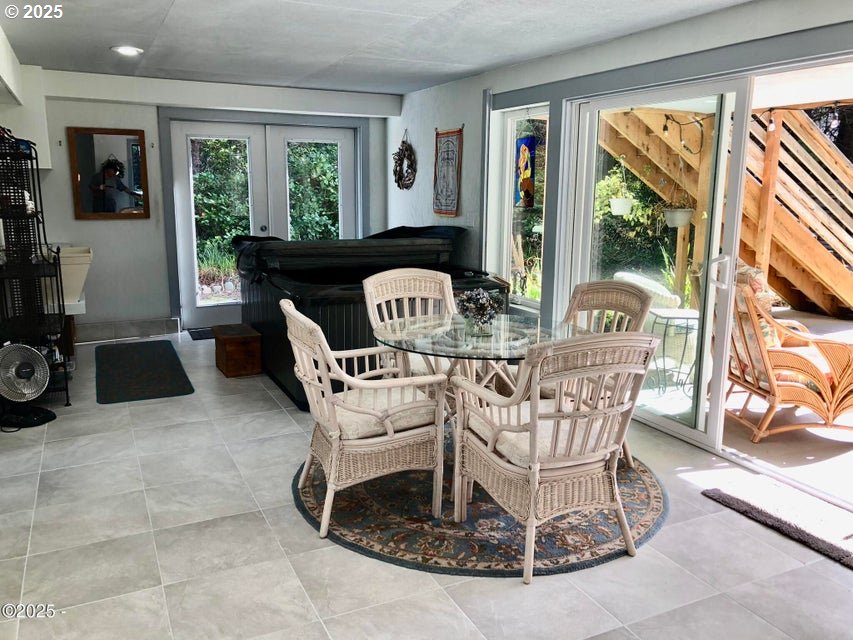 3512 Highway 101 Yachats, OR 97498 - Photo 5 of 39 a view of a dining room with furniture window and outside view