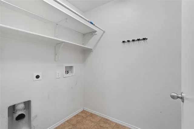 a view of small space with racks on the wall