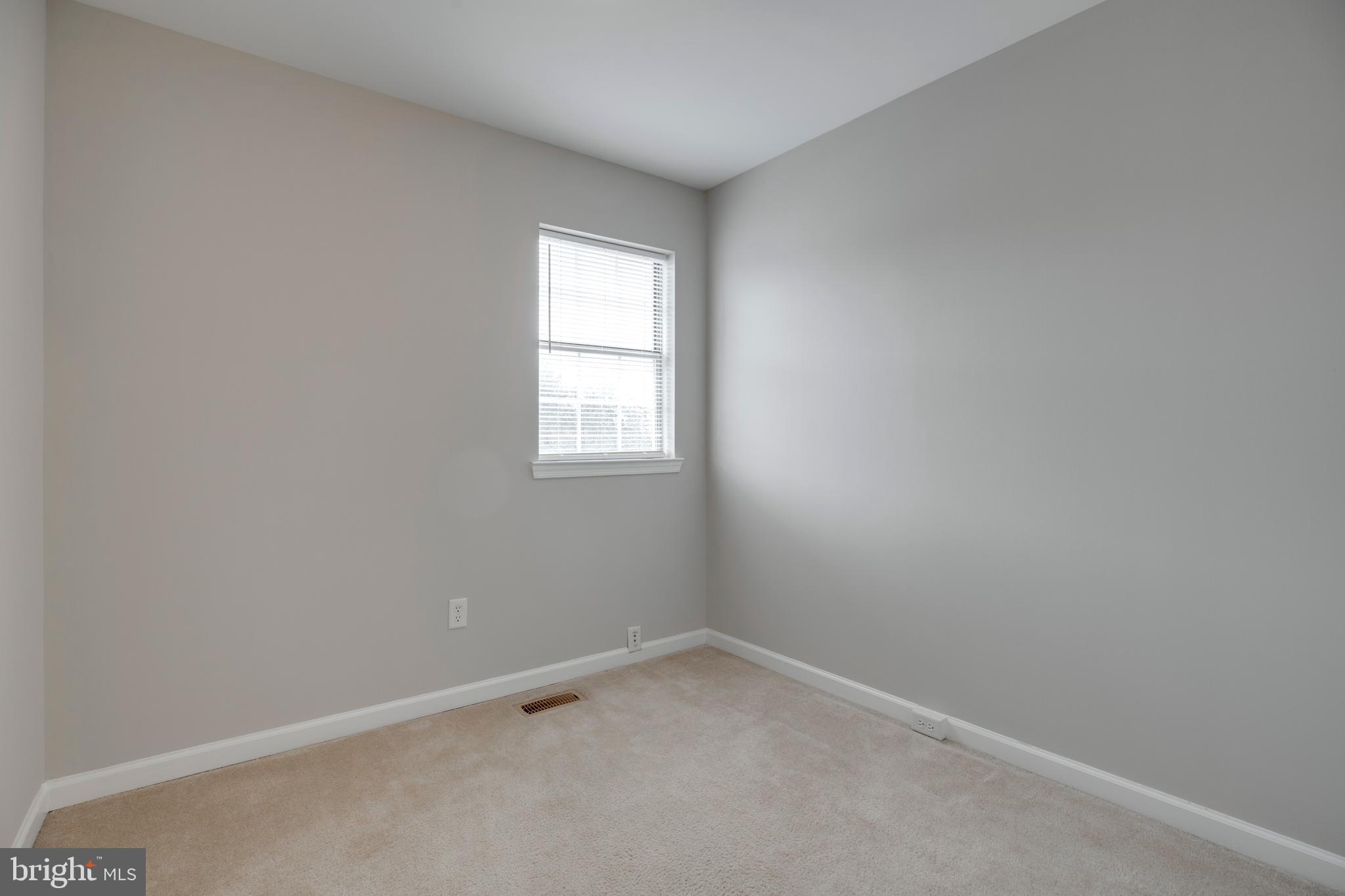 241 Coventry Square Sterling, VA 20164 - Photo 18 of 29 an empty room with a window