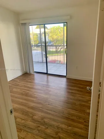a white toilet sitting next to a bathroom sink and a shower