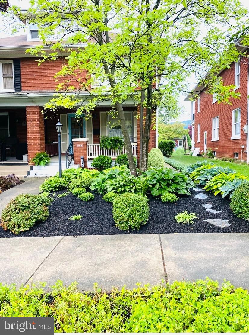 1013 Locust Street Columbia, PA 17512 - Photo 12 of 47 front view of a house with a garden