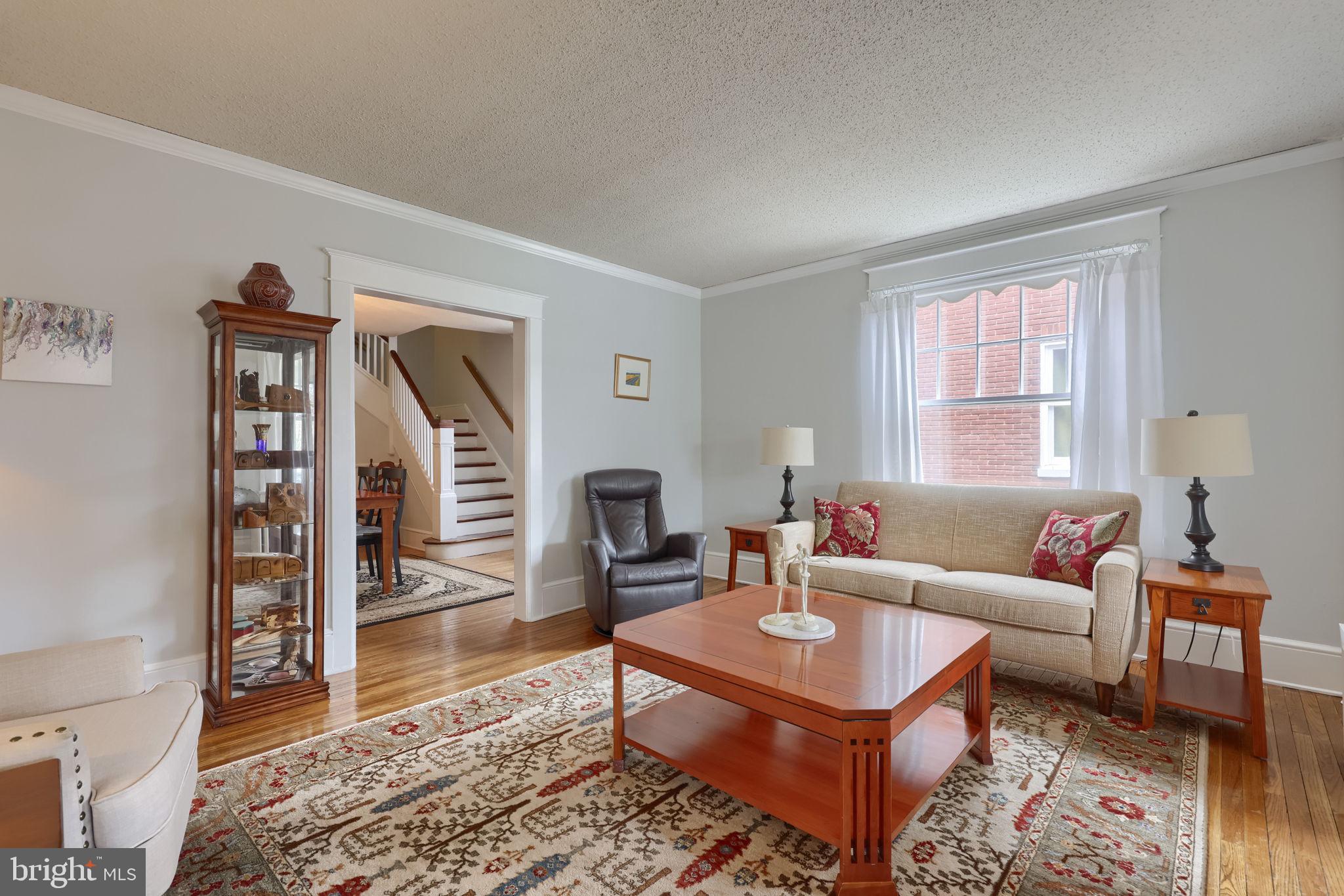 1013 Locust Street Columbia, PA 17512 - Photo 14 of 47 a living room with furniture a rug and a window