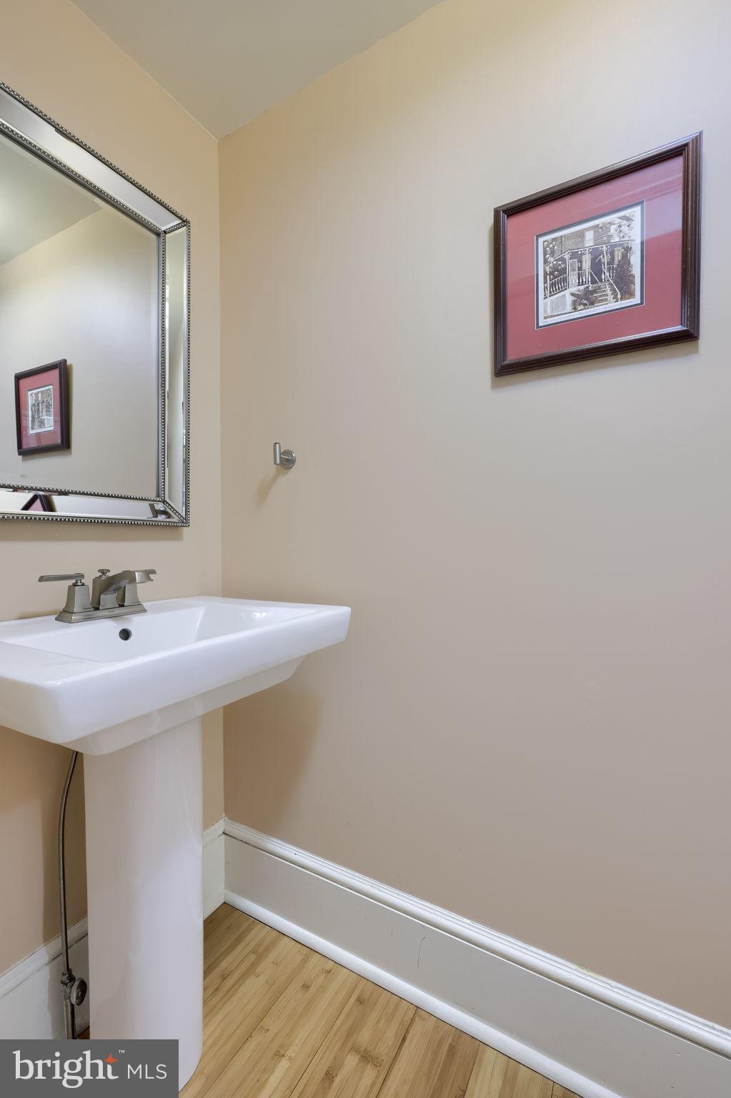 1013 Locust Street Columbia, PA 17512 - Photo 26 of 47 a bathroom with a sink and a mirror