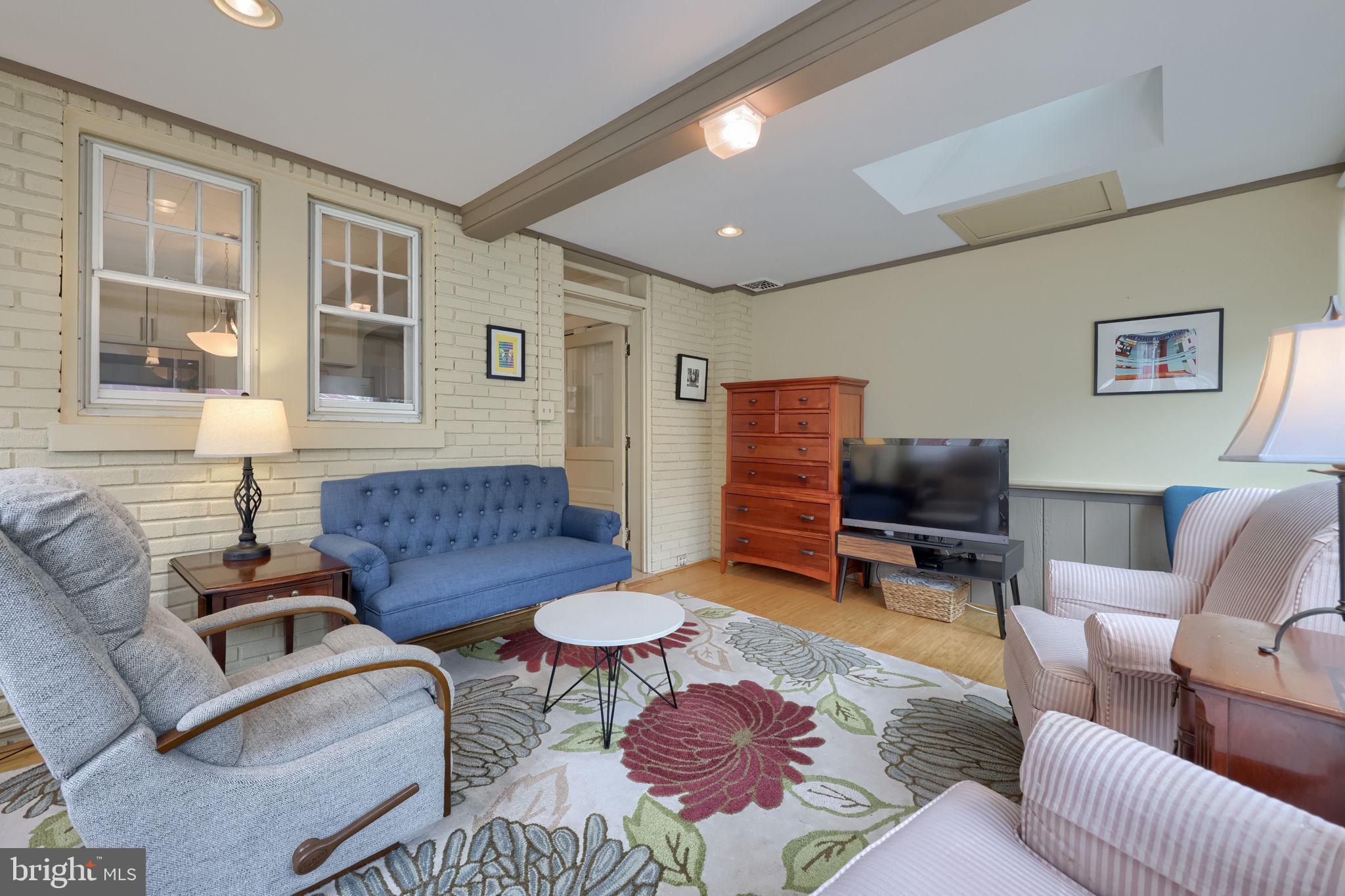 1013 Locust Street Columbia, PA 17512 - Photo 28 of 47 a living room with furniture a rug and a window