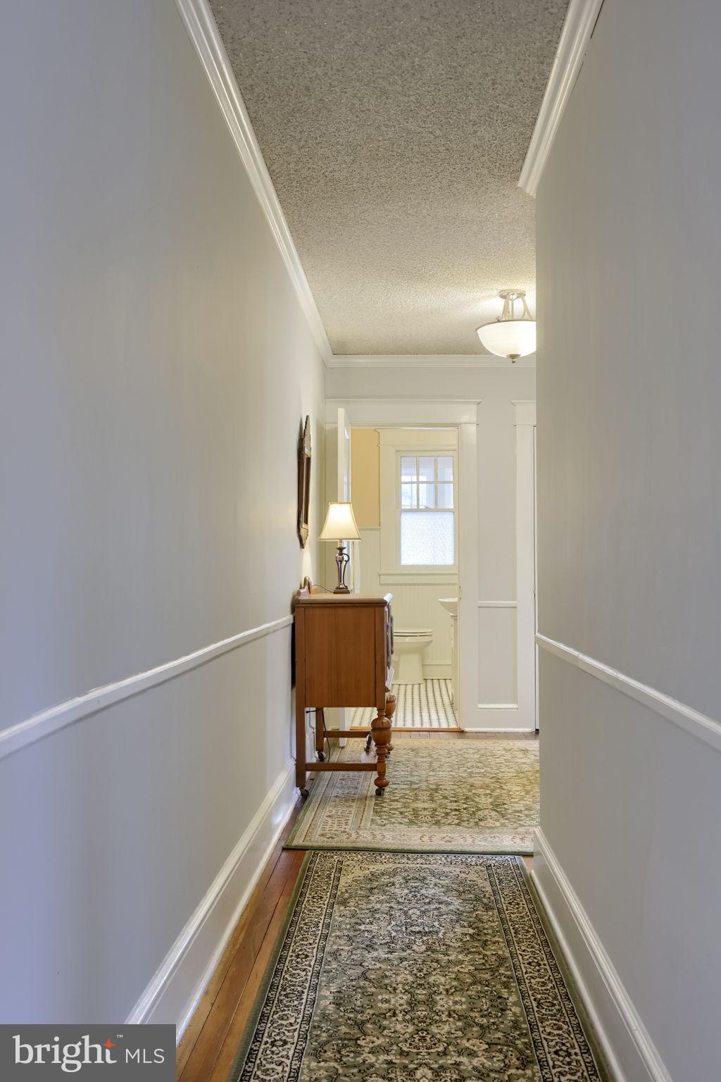 1013 Locust Street Columbia, PA 17512 - Photo 33 of 47 a view of a room with wooden floor and furniture